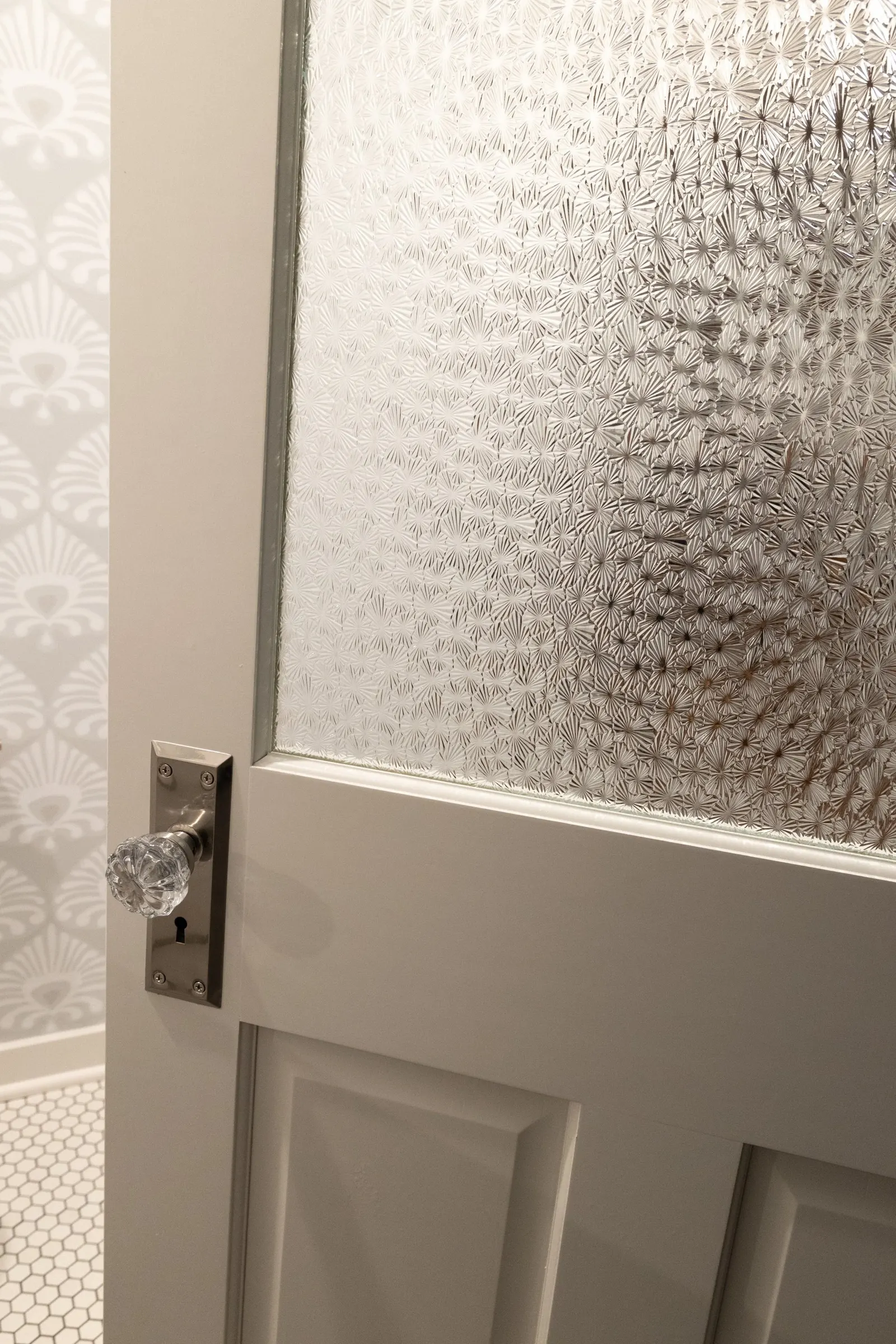 1922 Bathroom Remodel, whole home remodel, vintage door, vintage hardware, wallpaper, brushed gold finishes, open shelving, floating shelves, Lincoln Nebraska, professional contractors, remodeling and renovations.