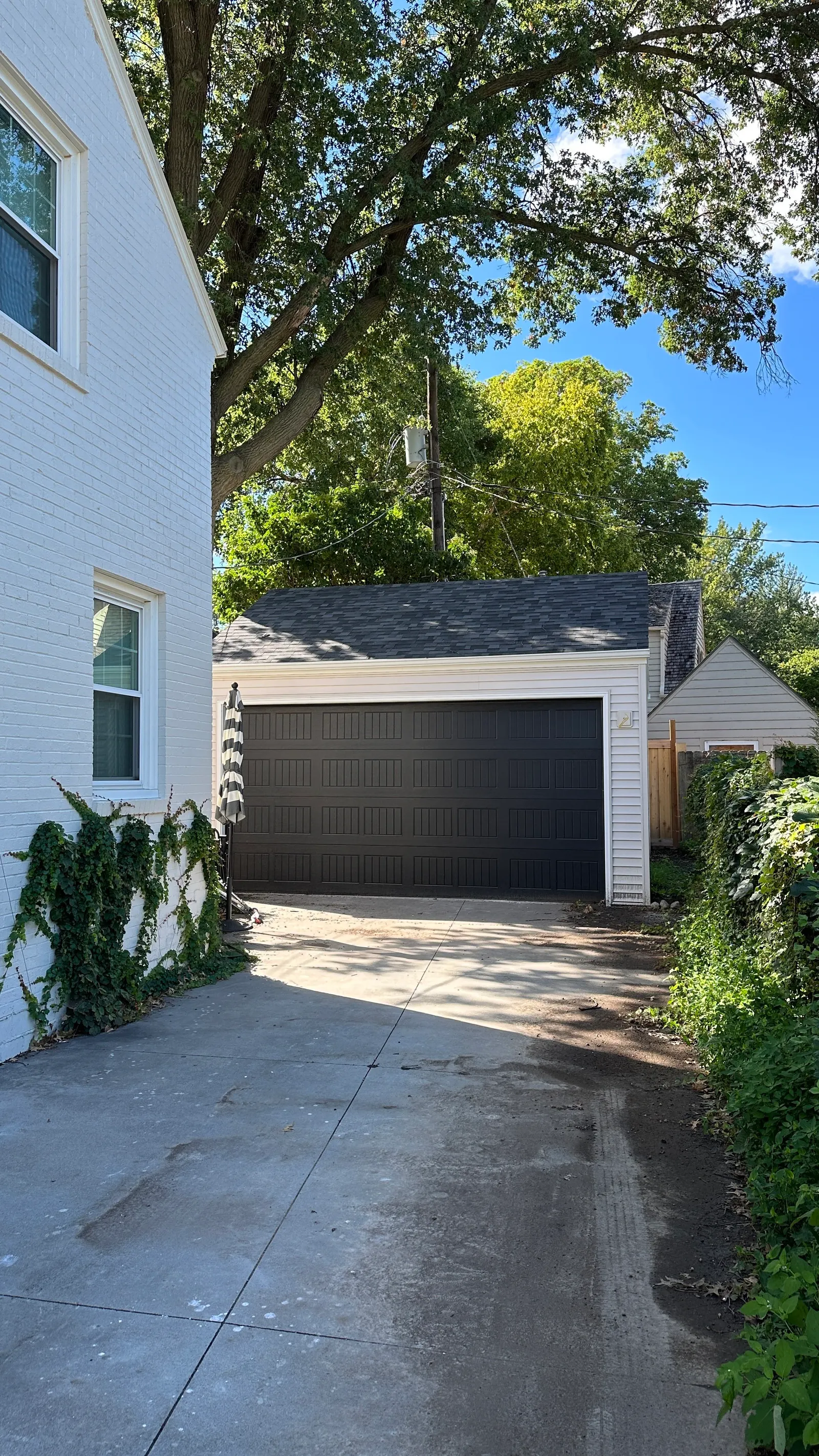 1935 Garage Remodel, Lincoln Nebraska, professional contractors, craftsmanship, black garage door, detached garage