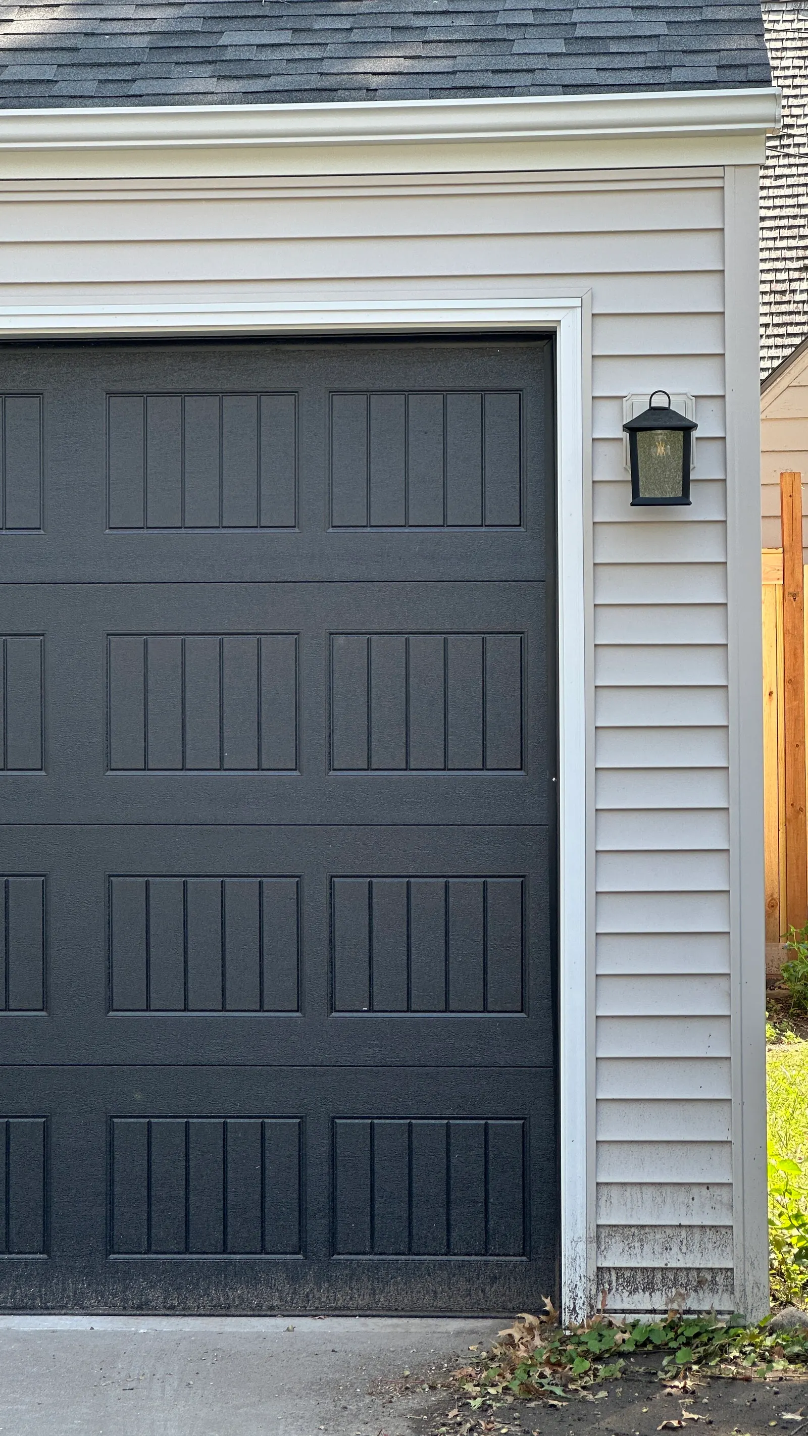 1935 Garage Remodel, Lincoln Nebraska, professional contractors, craftsmanship, black garage door, detached garage, matte black light fixture