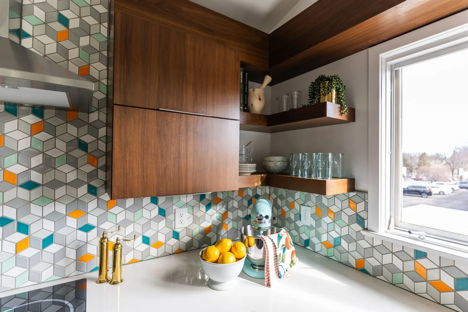 1956 Kitchen Remodel, mid century modern design, mixed metals, wood cabinets, colorful tile backsplash, white quartz countertops, large windows, wood floors, vaulted ceilings, craftsmanship, custom cabinets, floating shelves.