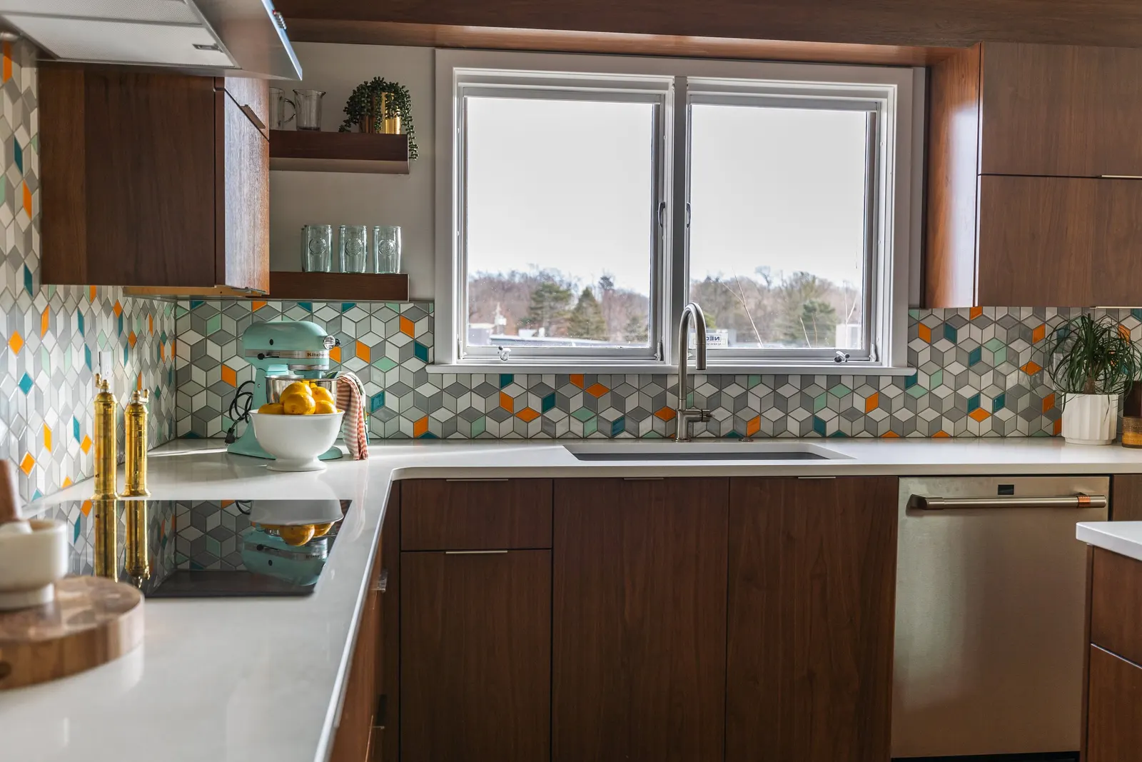 1956 Kitchen Remodel, mid century modern design, mixed metals, wood cabinets, colorful tile backsplash, white quartz countertops, large windows, wood floors, vaulted ceilings, craftsmanship, custom cabinets, large island.