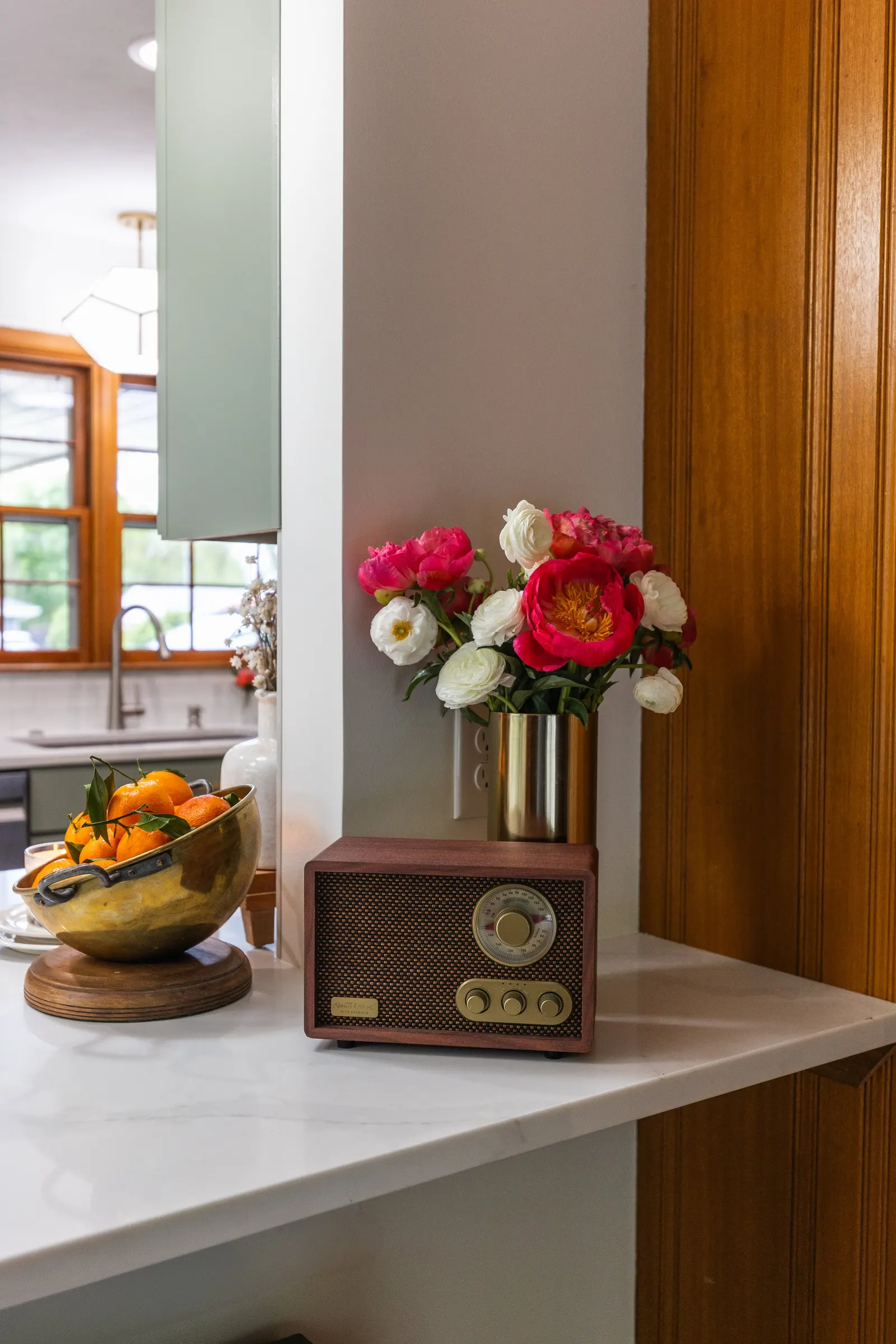 1958 Kitchen Remodel, mid century design, wood floors, stainless steel appliances, sage green cabinets, brushed gold hardware, white quartz countertop, modern light fixtures, Lincoln Nebraska, professional contractors, remodeling and renovations.