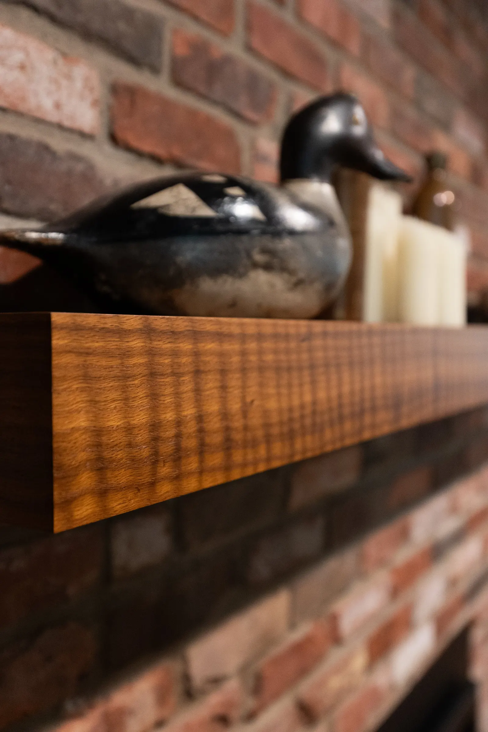 1974 Living Room Remodel, whole home remodel, wood floors, craftsmanship, farmhouse style, large windows, custom wood beams, brick fireplace, wood built-ins, can lighting, dark wood, craftsmanship, wood mantel.