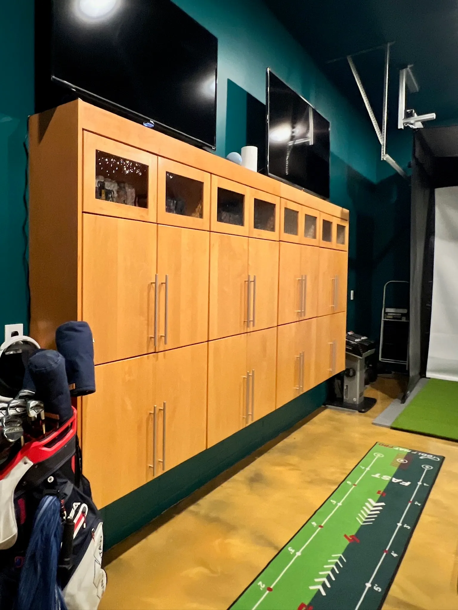 2007 Garage Remodel, whole home remodel, custom wood cabinets, epoxy floor, golf simulator, Lincoln Nebraska