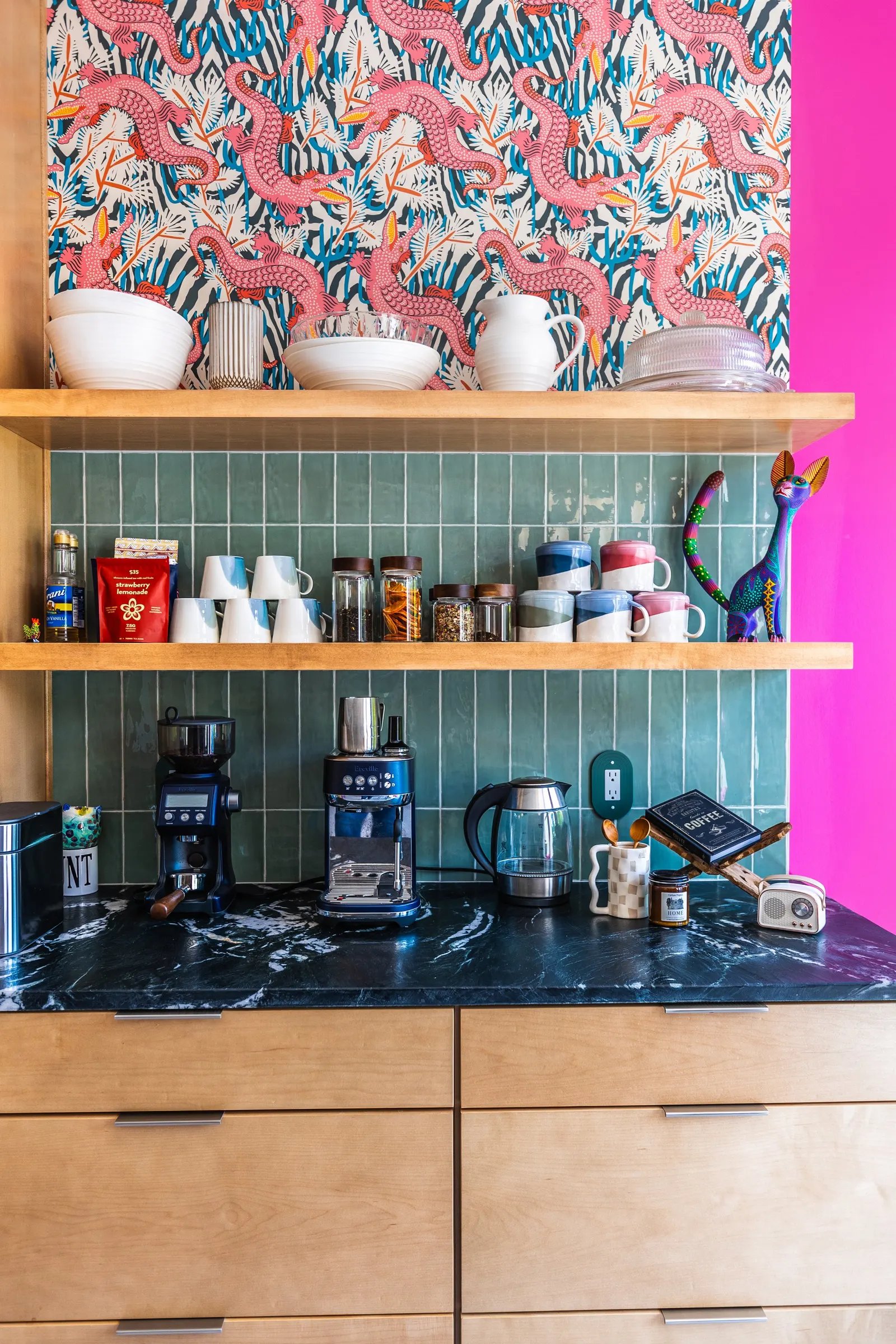 2007 Kitchen Remodel, vibrant pink accents, green tile backsplash, wooden cabinets, brushed nickel hardware, quartz countertop, large island, pendant lights, open shelving, floating shelves, tile floor, coffee bar, wallpaper, eat in kitchen, addition
