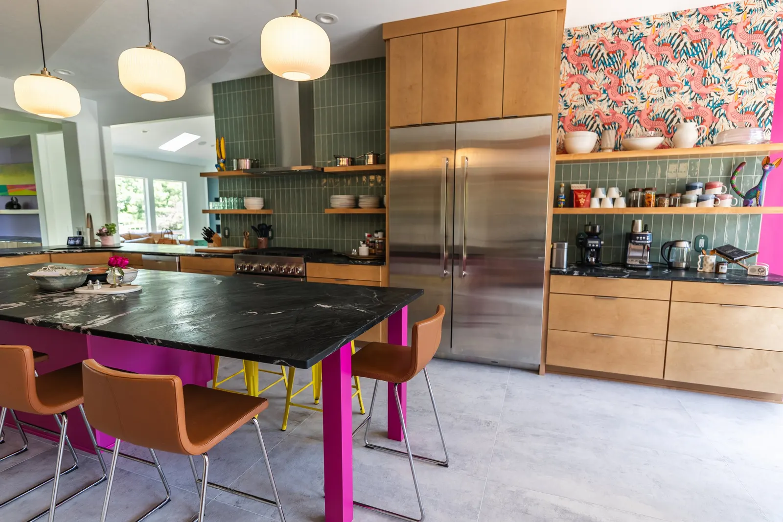 2007 Kitchen Remodel, vibrant pink accents, green tile backsplash, wooden cabinets, brushed nickel hardware, quartz countertop, large island, pendant lights, open shelving, floating shelves, tile floor, coffee bar, wallpaper, eat in kitchen, addition