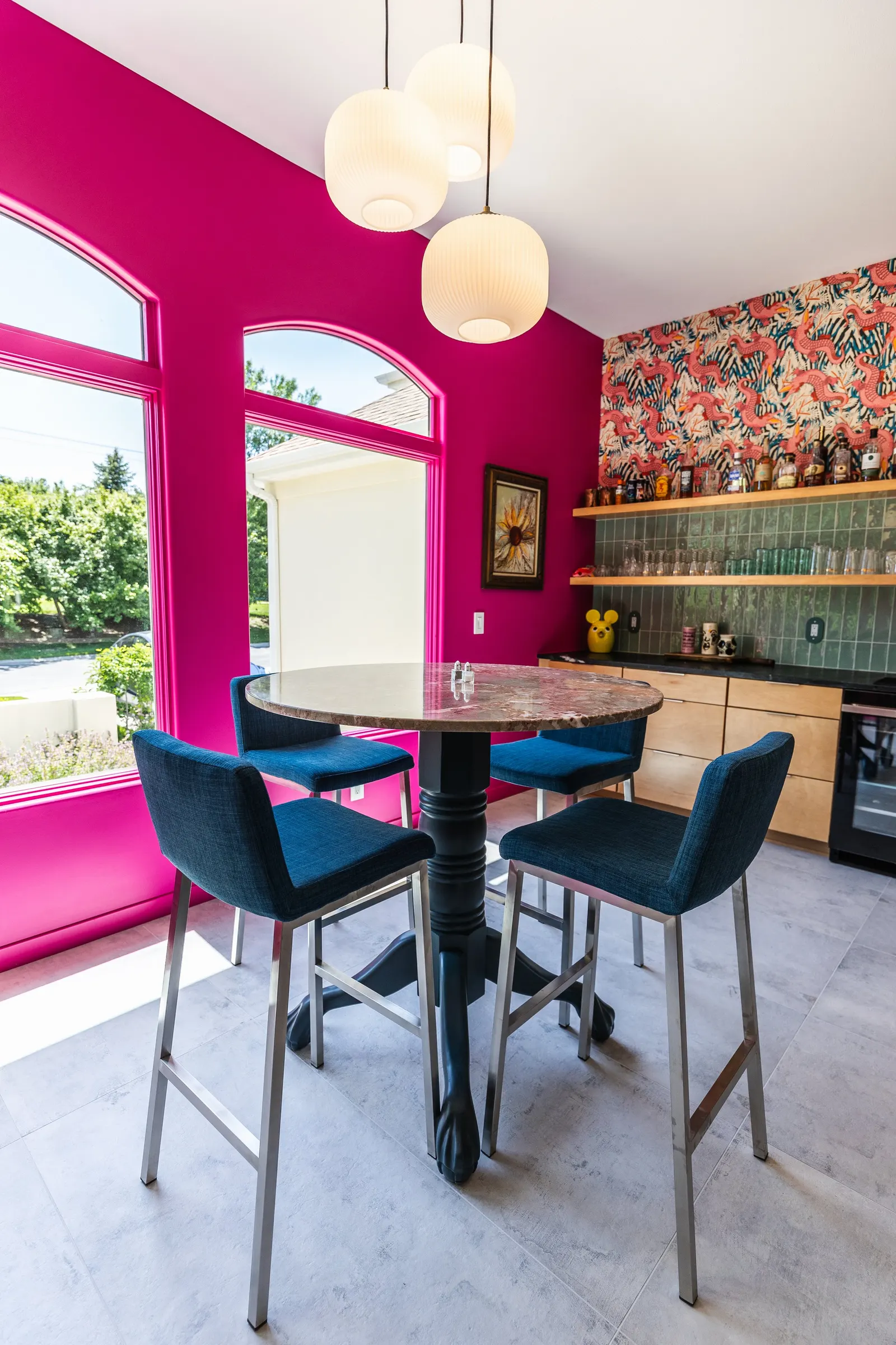 2007 Kitchen Remodel, vibrant pink accents, green tile backsplash, wooden cabinets, brushed nickel hardware, quartz countertop, large island, pendant lights, open shelving, floating shelves, tile floor, coffee bar, wallpaper, eat in kitchen, addition
