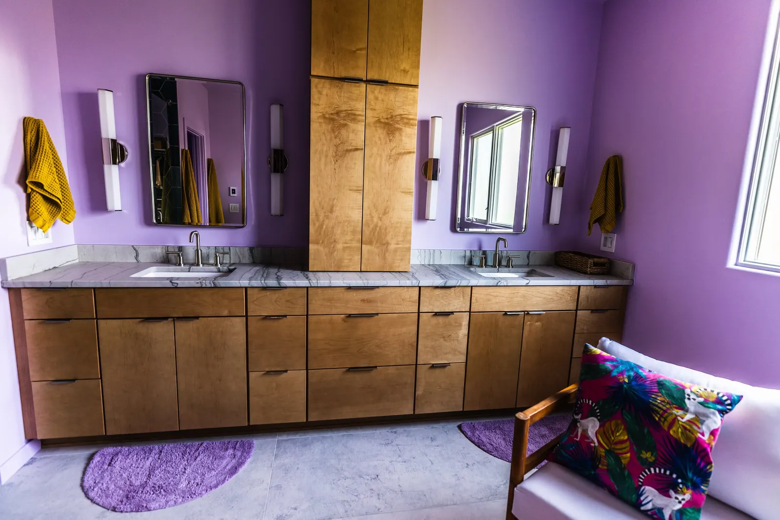 2007 Primary En-Suite Remodel, color drenching, violet, large windows, unique light fixtures, primary suite, tile floors, bathtub, hexagon tile, brushed nickel fixtures, brushed nickel hardware, bathroom suite, wood vanity, bathroom storage.