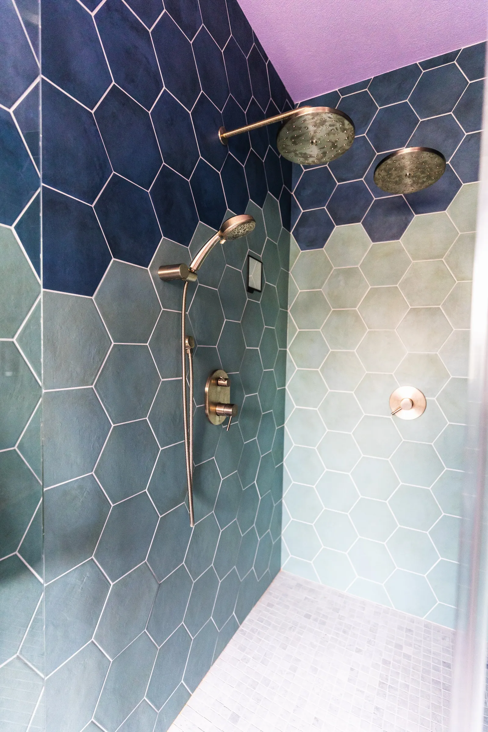 2007 Primary En-Suite Remodel, color drenching, violet, large windows, unique light fixtures, primary suite, tile floors, bathtub, hexagon tile, brushed nickel fixtures, brushed nickel hardware, bathroom suite, walk-in shower.