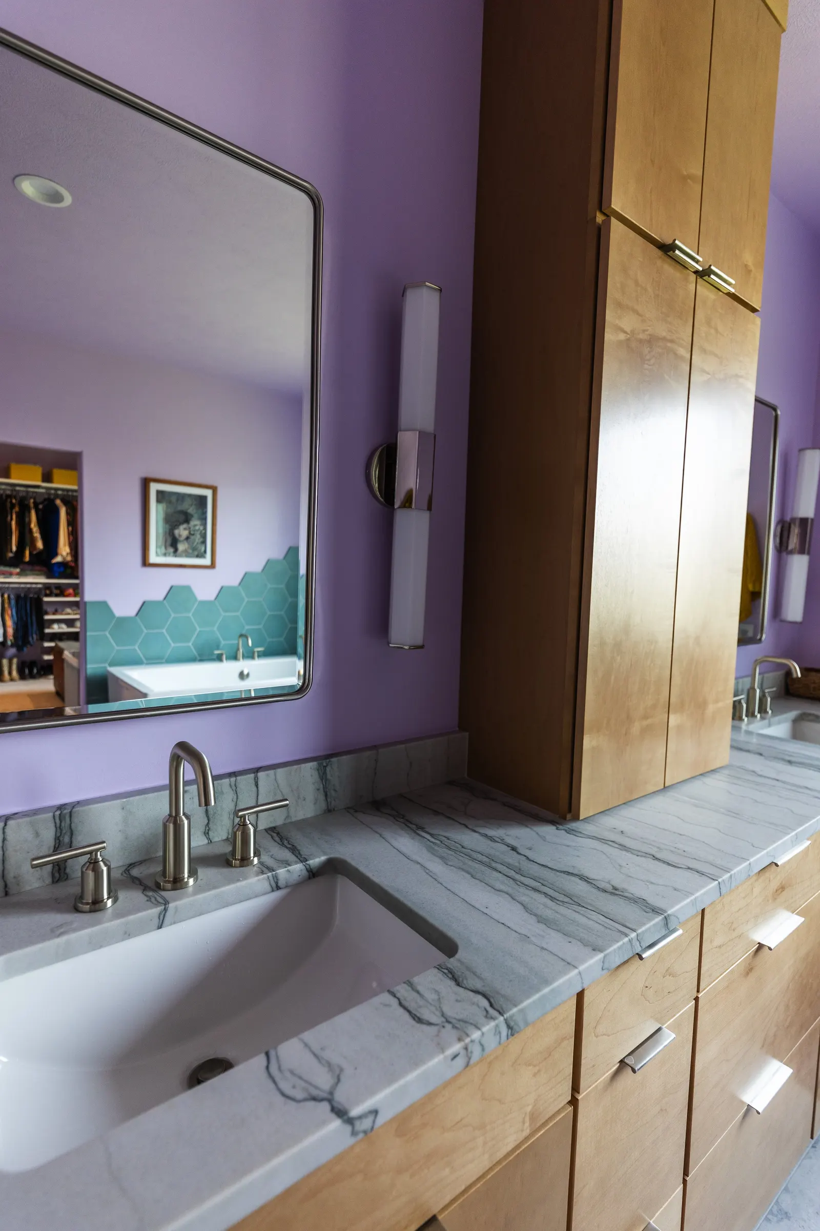 2007 Primary En-Suite Remodel, color drenching, violet, large windows, unique light fixtures, primary suite, tile floors, bathtub, hexagon tile, brushed nickel fixtures, brushed nickel hardware, bathroom suite, wood vanity, bathroom storage.