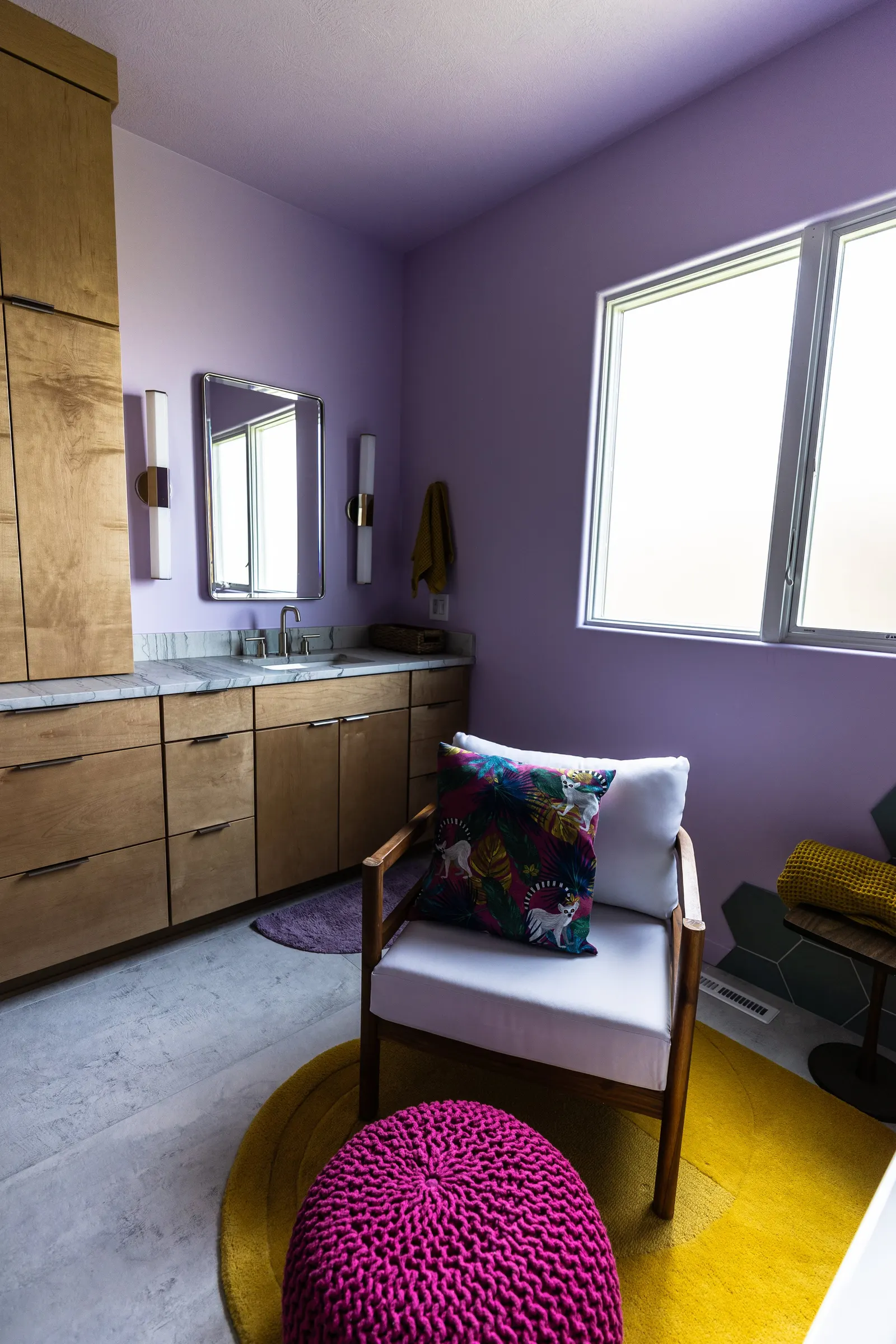 2007 Primary En-Suite Remodel, color drenching, violet, large windows, unique light fixtures, primary suite, tile floors, bathtub, hexagon tile, brushed nickel fixtures, brushed nickel hardware, bathroom suite, wood vanity, bathroom storage.