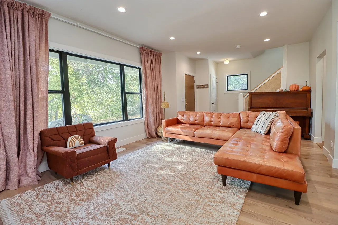 Forest House Living Room Remodel, whole home remodel, open concept, wood floors, boho chic, mid century modern design, can lighting, craftsmanship.