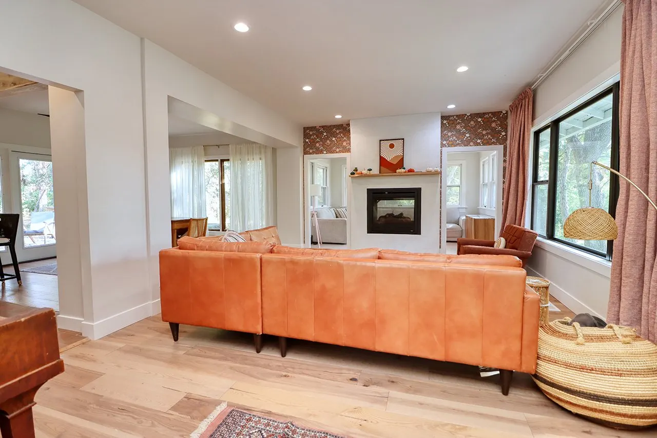 Forest House Living Room Remodel, whole home remodel, open concept, wood floors, boho chic, mid century modern design, can lighting, craftsmanship, fireplace, mantel.